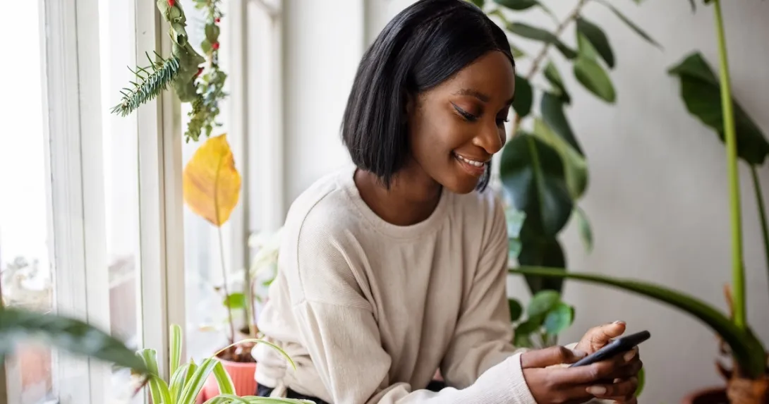 Person looking at data on a cell phone Person looking at data on a cell phone