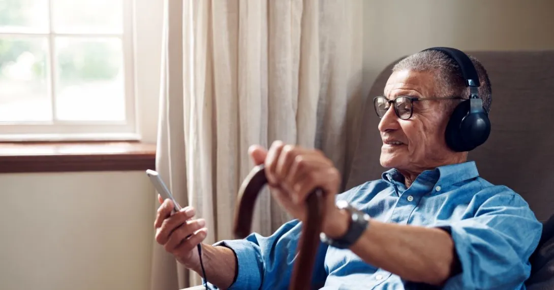 man in chair with cane man in chair with cane