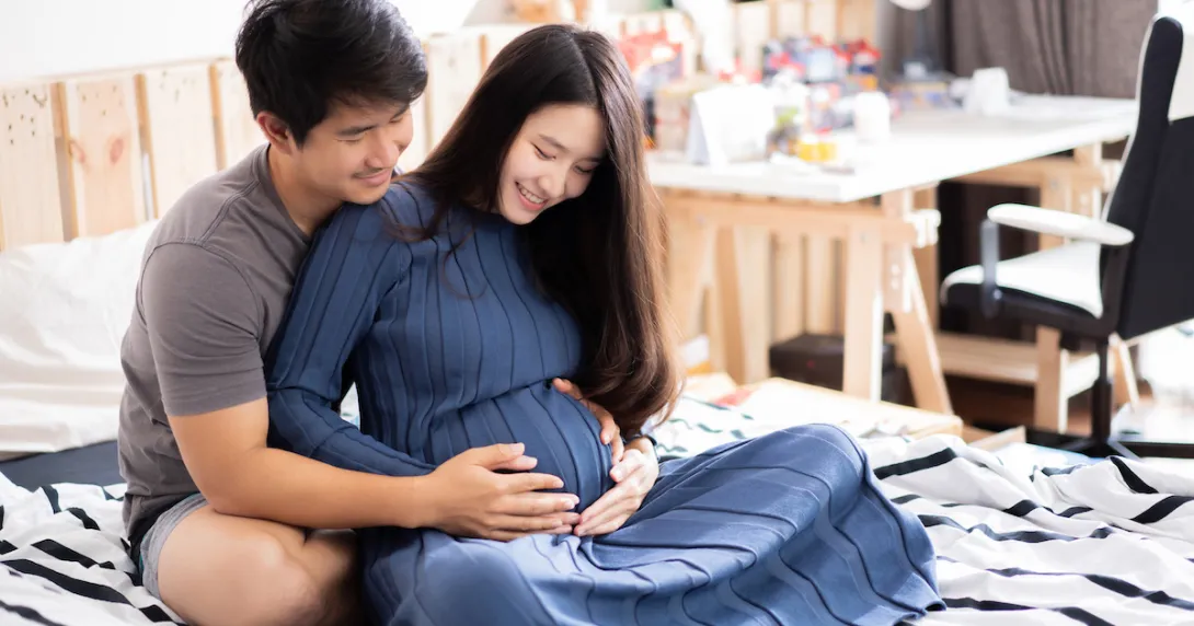 Two people sitting on the floor Two people sitting on the floor