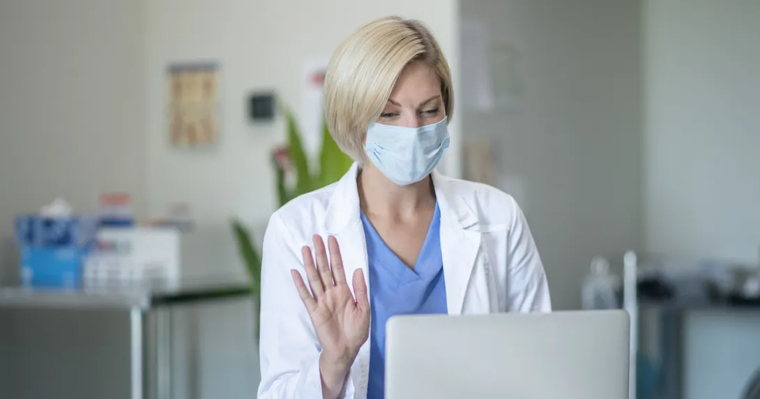 Healthcare provider on a computer Healthcare provider on a computer