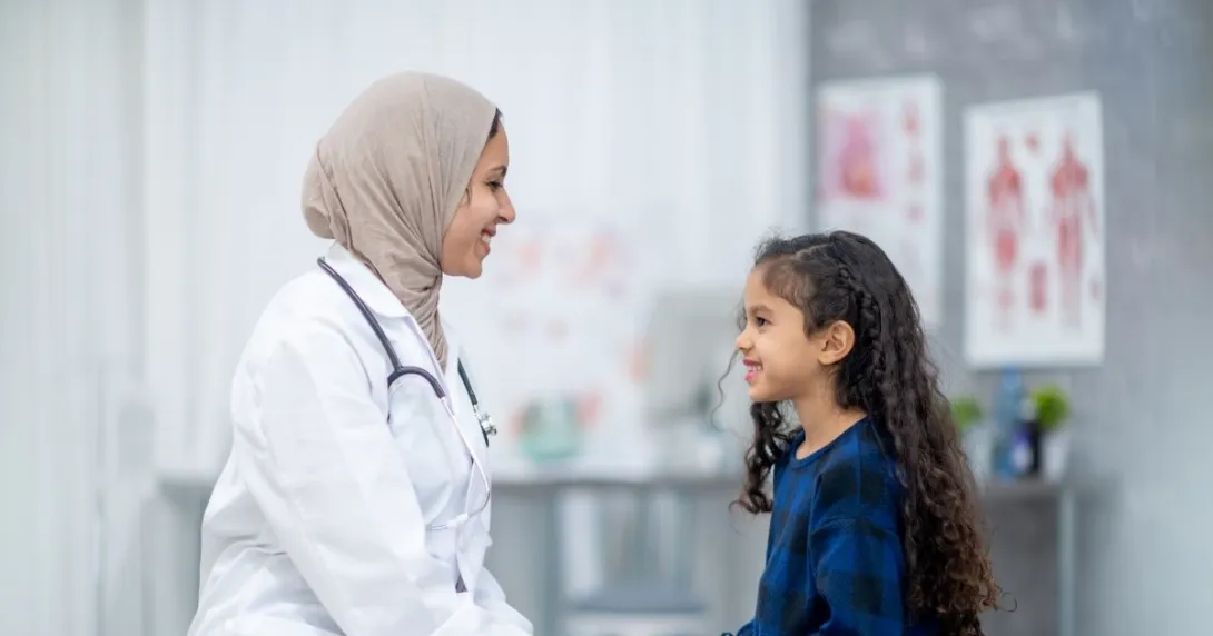 Two people sitting and discussing Two people sitting and discussing