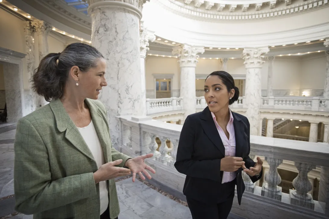 Two legislators talking in the U.S. Capitol Two legislators talking in the U.S. Capitol