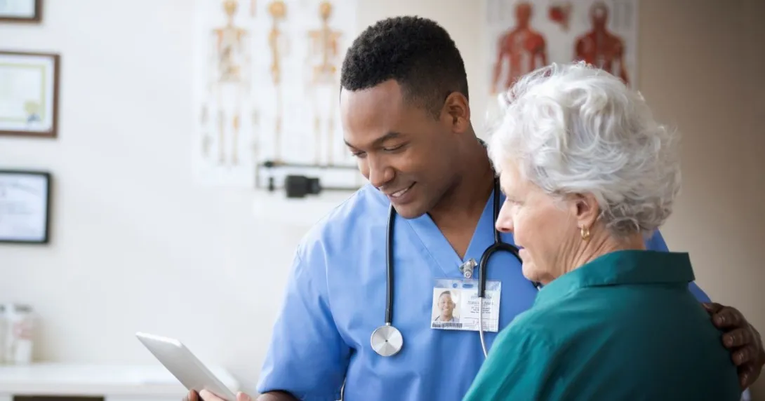 Two people looking at notes Two people looking at notes