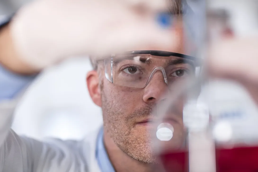 Researcher at work in a lab Researcher at work in a lab