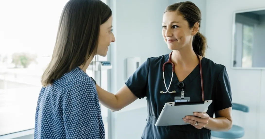 Patient consulting with healthcare professional Patient consulting with healthcare professional