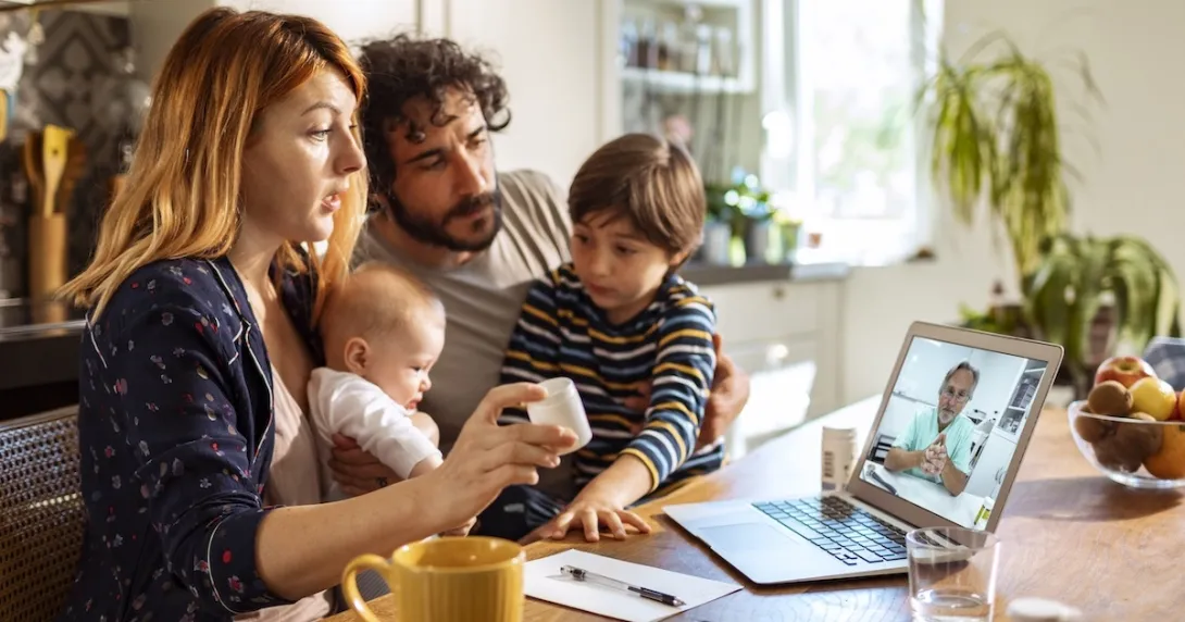 Photo of a family, mon, dad, two children Photo of a family, mon, dad, two children