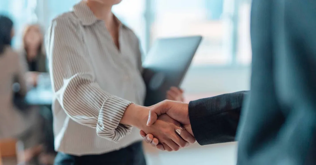 Two people shaking hands Two people shaking hands