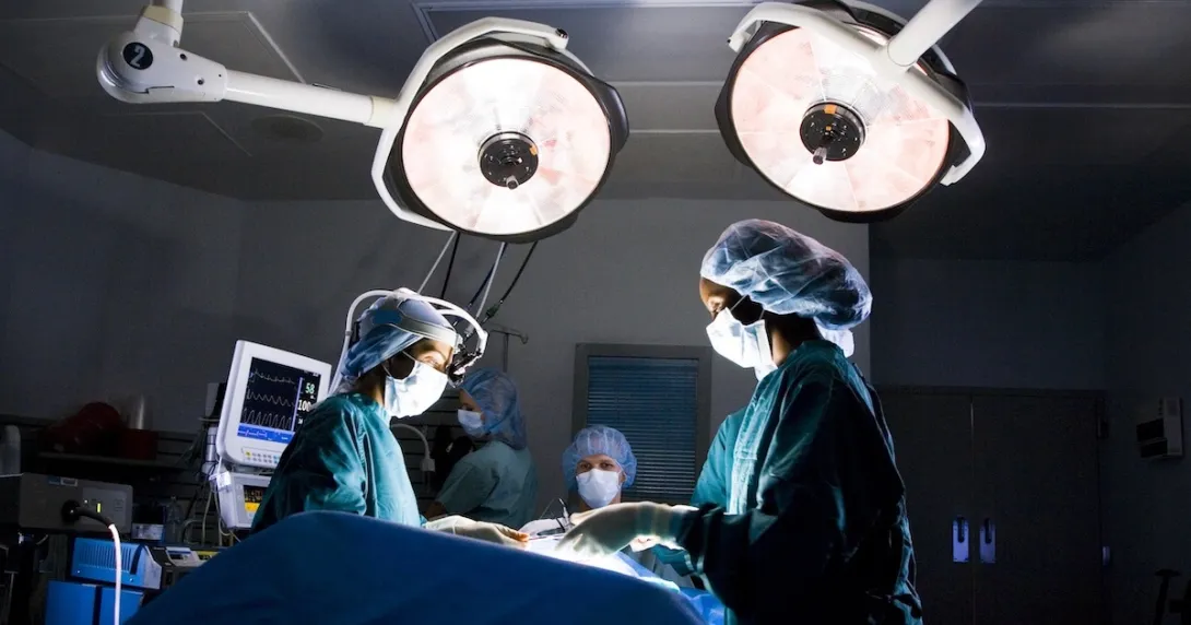 Surgeons in an operating room Surgeons in an operating room