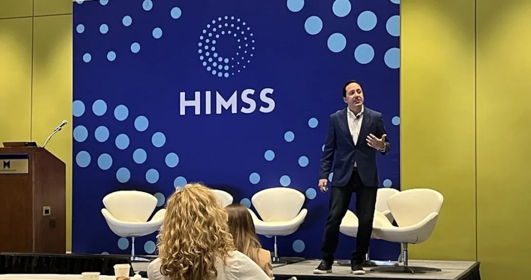 Aaron Miri, senior vice president and chief digital and information officer at Baptist Health on stage at HIMSS23