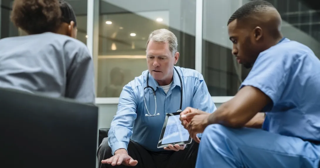 Physicians reviewing data Physicians reviewing data