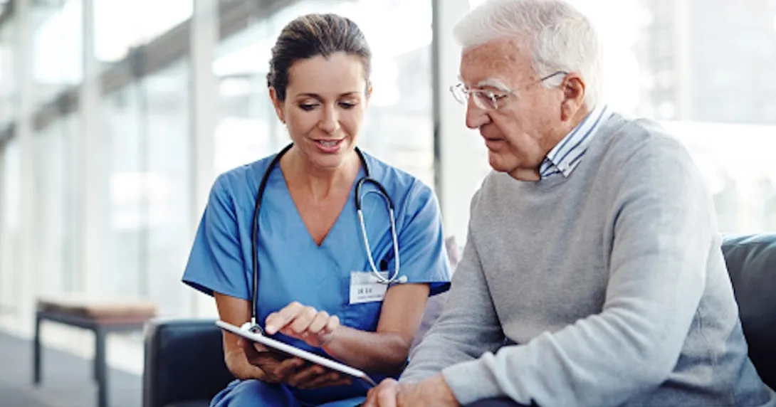 Heathcare professional consulting with patient.