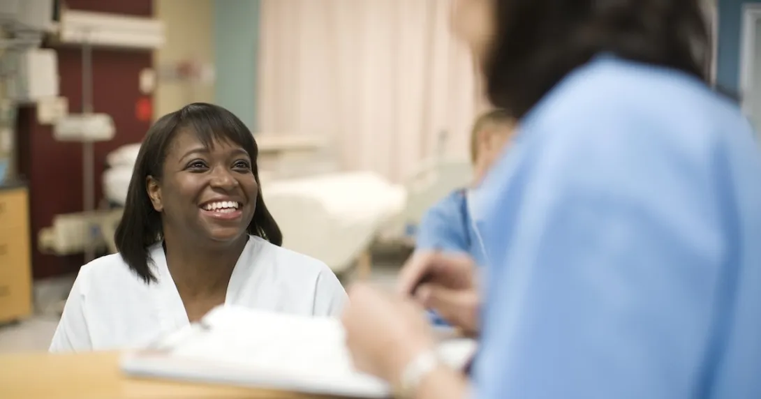 Healthcare professional engaging with patient Healthcare professional engaging with patient