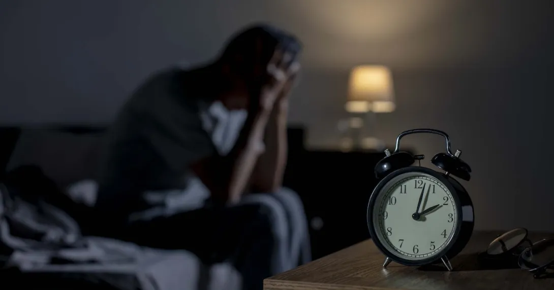 Person unable to sleep in the middle of the night Person unable to sleep in the middle of the night