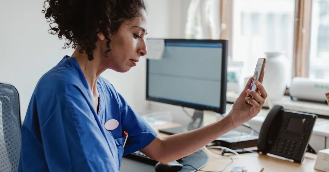 Physician on a telephone Physician on a telephone