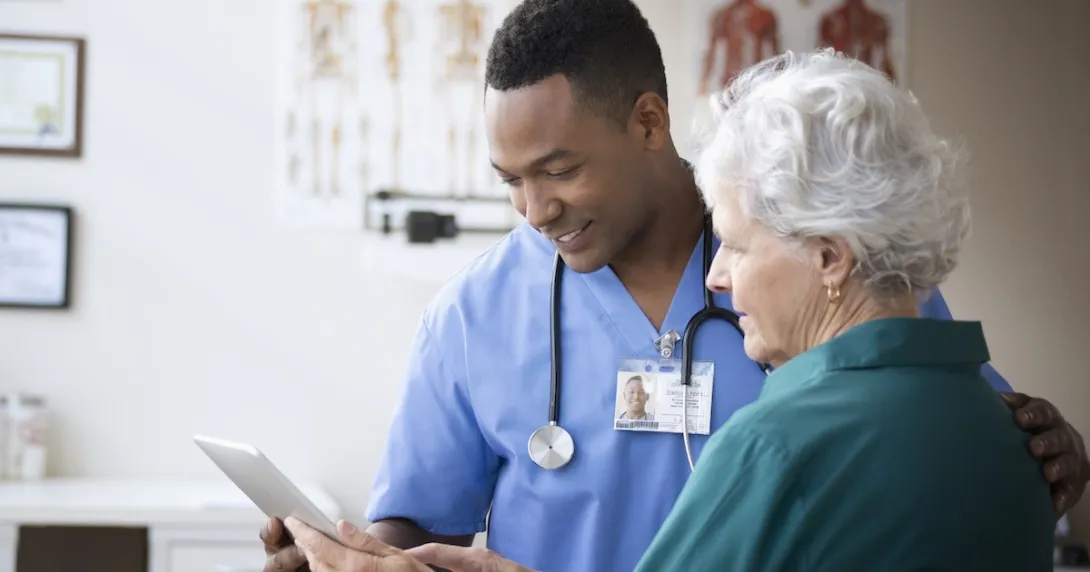 Nurse consulting with patient Nurse consulting with patient