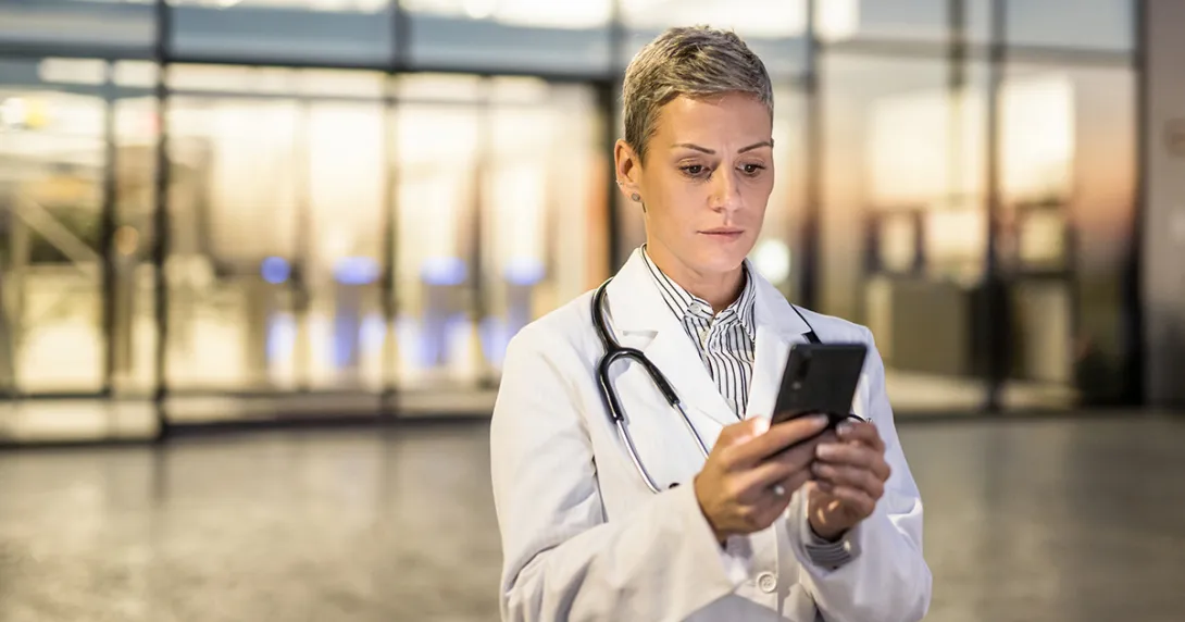 Doctor using smartphone