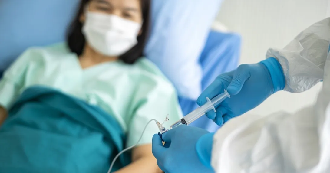 Patient receiving IV medication Patient receiving IV medication