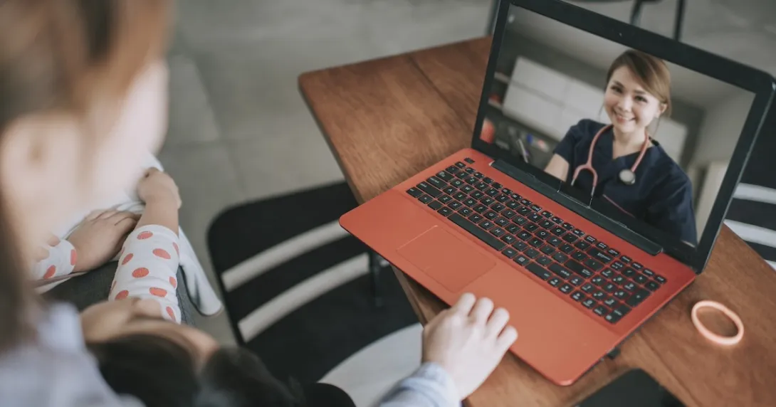 Healthcare professional interacting with a patient via telehealth platform Healthcare professional interacting with a patient via telehealth platform