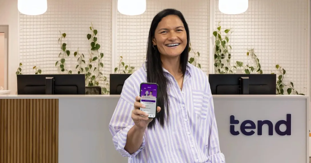 Olympian Valeria Adams showing the Tend Health app Olympian Valeria Adams showing the Tend Health app