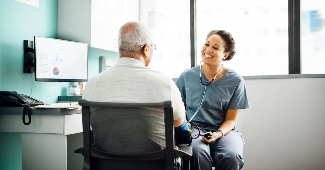 A doctor talking with a patient.