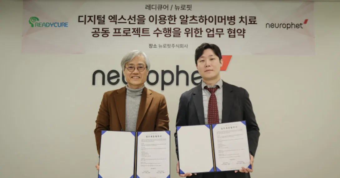 ReadyCure CEO Won-gyu Jeong and Neurophet CEO Jun-gil Bin during the signing of a business deal ReadyCure CEO Won-gyu Jeong and Neurophet CEO Jun-gil Bin during the signing of a business deal