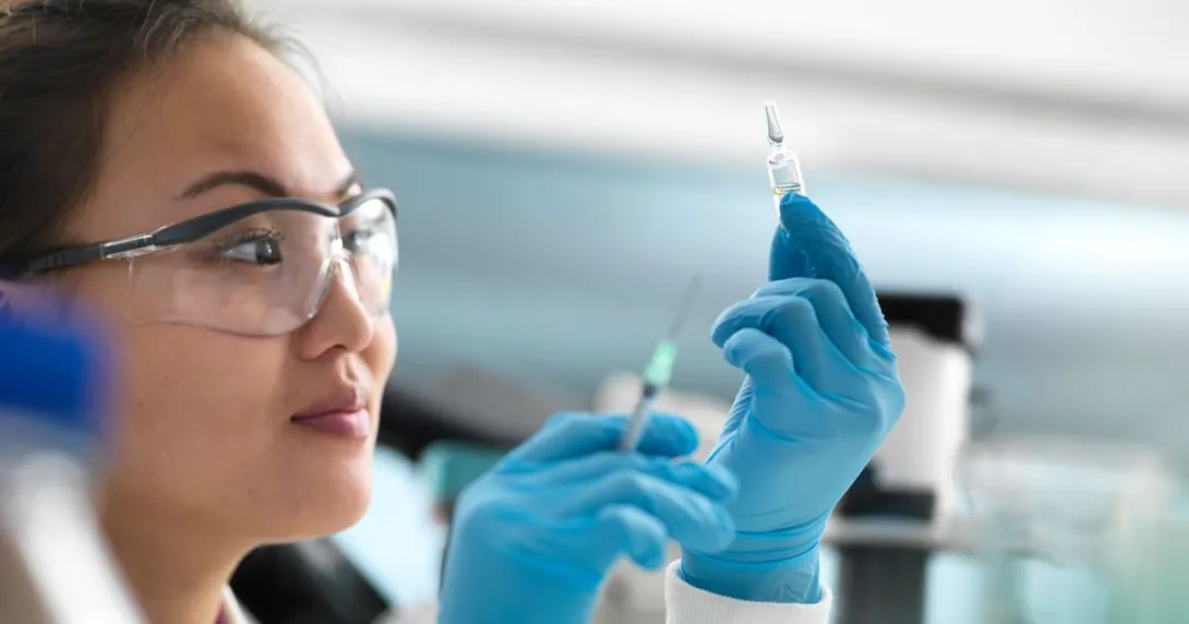 A researcher working in a lab A researcher working in a lab