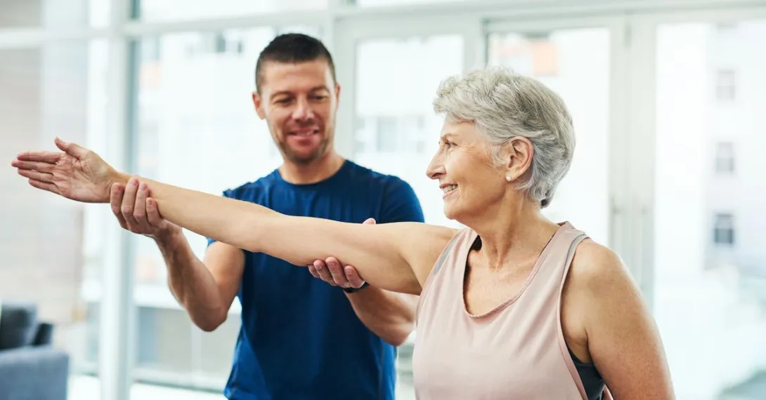 Caregiver exercising a care taker Caregiver exercising a care taker