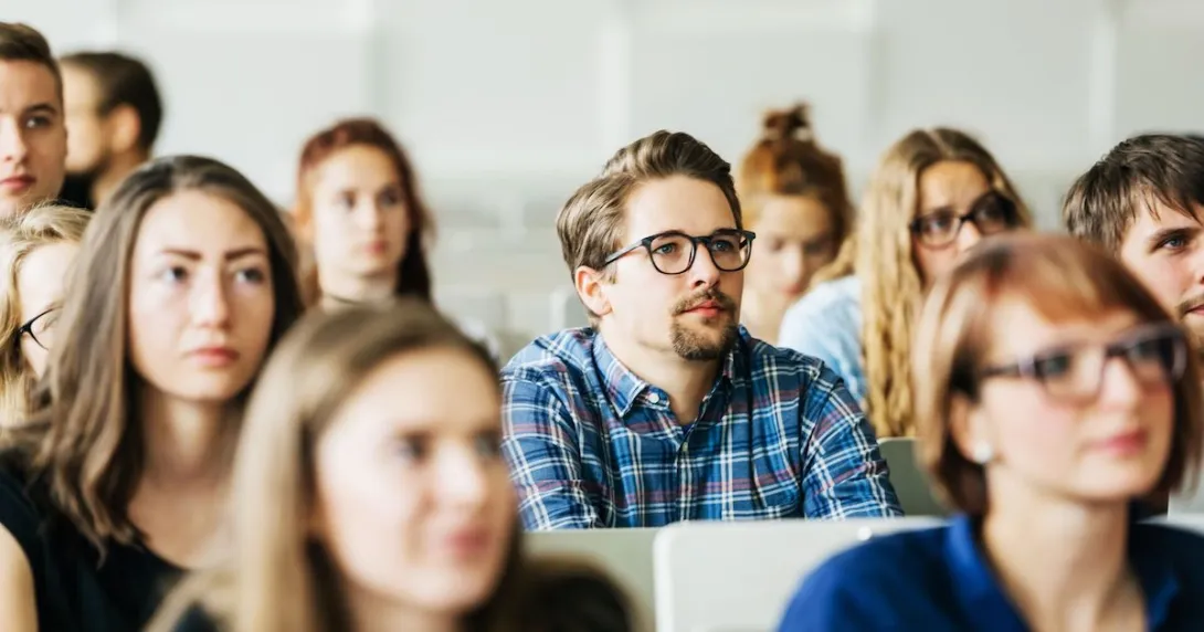 College students sitting in a classroom College students sitting in a classroom