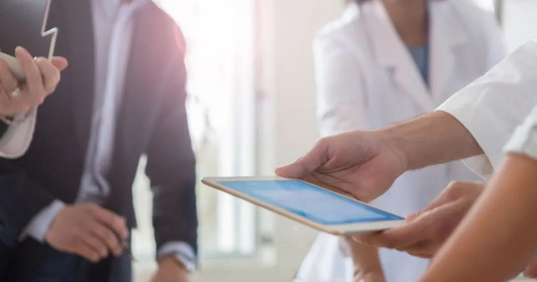 Hospital management signing a contract